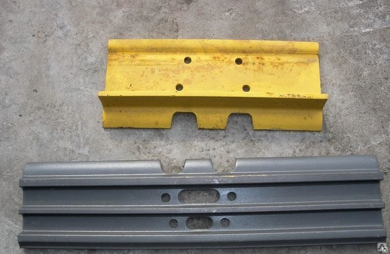 Башмак экскаватора. Резиновые башмаки на экскаватор. Башмак komatsu d65 6 отверстий. Башмак shantui sd22. Башмак экскаватора комацу.